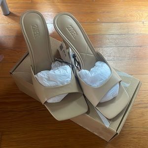 Beige leather heeled mules